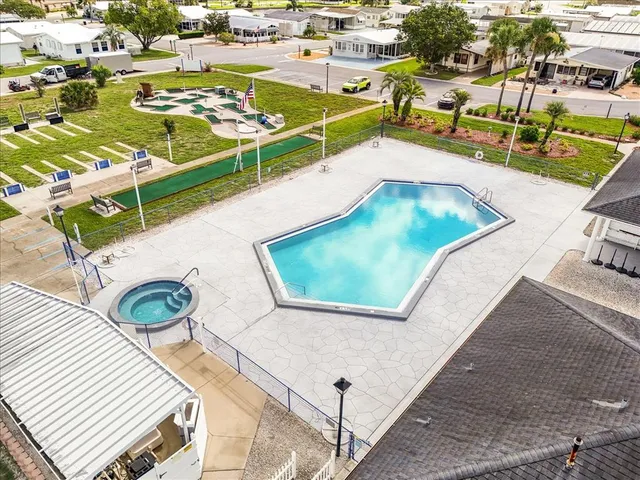a view of an outdoor space pool patio and outdoor seating