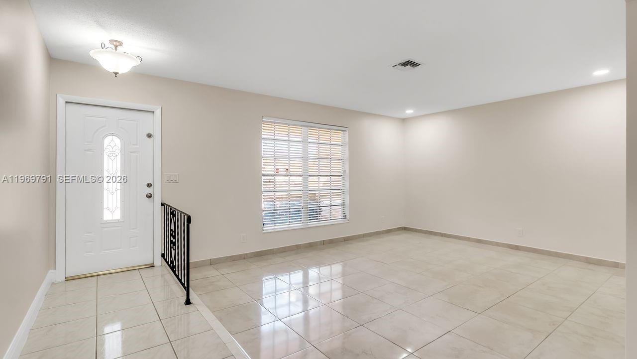 5300 Grant Street Hollywood, FL 33021 - Photo 14 of 46 a view of an empty room with a window