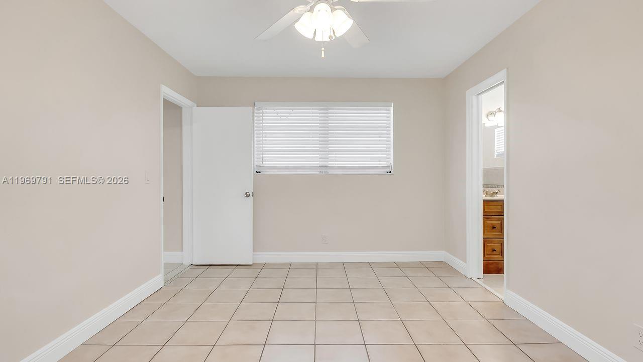 5300 Grant Street Hollywood, FL 33021 - Photo 23 of 46 a view of an empty room with window