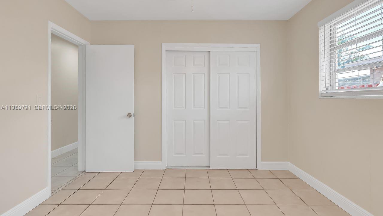 5300 Grant Street Hollywood, FL 33021 - Photo 27 of 46 a view of an empty room and window