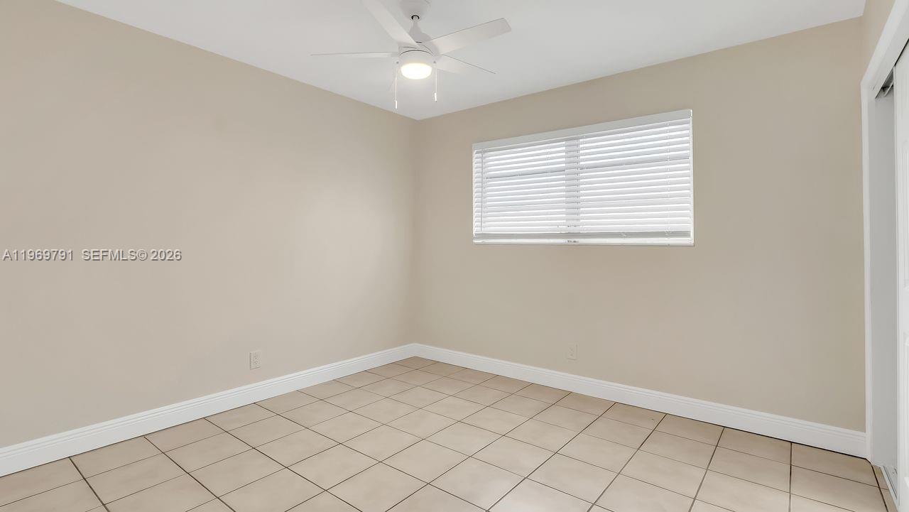 5300 Grant Street Hollywood, FL 33021 - Photo 28 of 46 an empty room with a window
