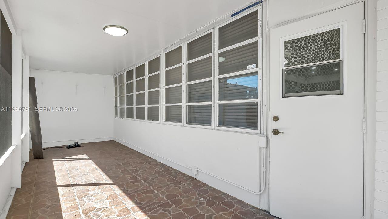 5300 Grant Street Hollywood, FL 33021 - Photo 37 of 46 a view of an empty room with a window
