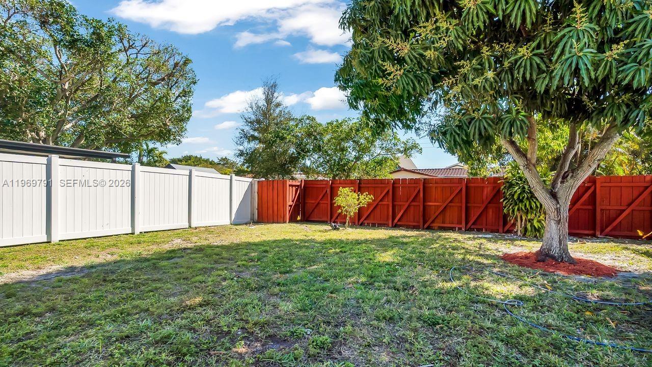 5300 Grant Street Hollywood, FL 33021 - Photo 38 of 46 a view of backyard with tree