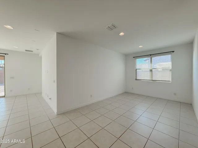 a kitchen with stainless steel appliances a sink a stove a microwave and cabinets