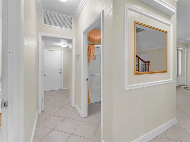 a bathroom with a toilet a sink and a mirror