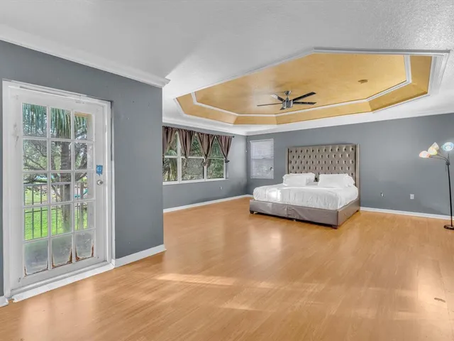 a view of balcony with wooden floor
