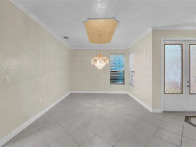 a view of a kitchen with a sink and cabinets
