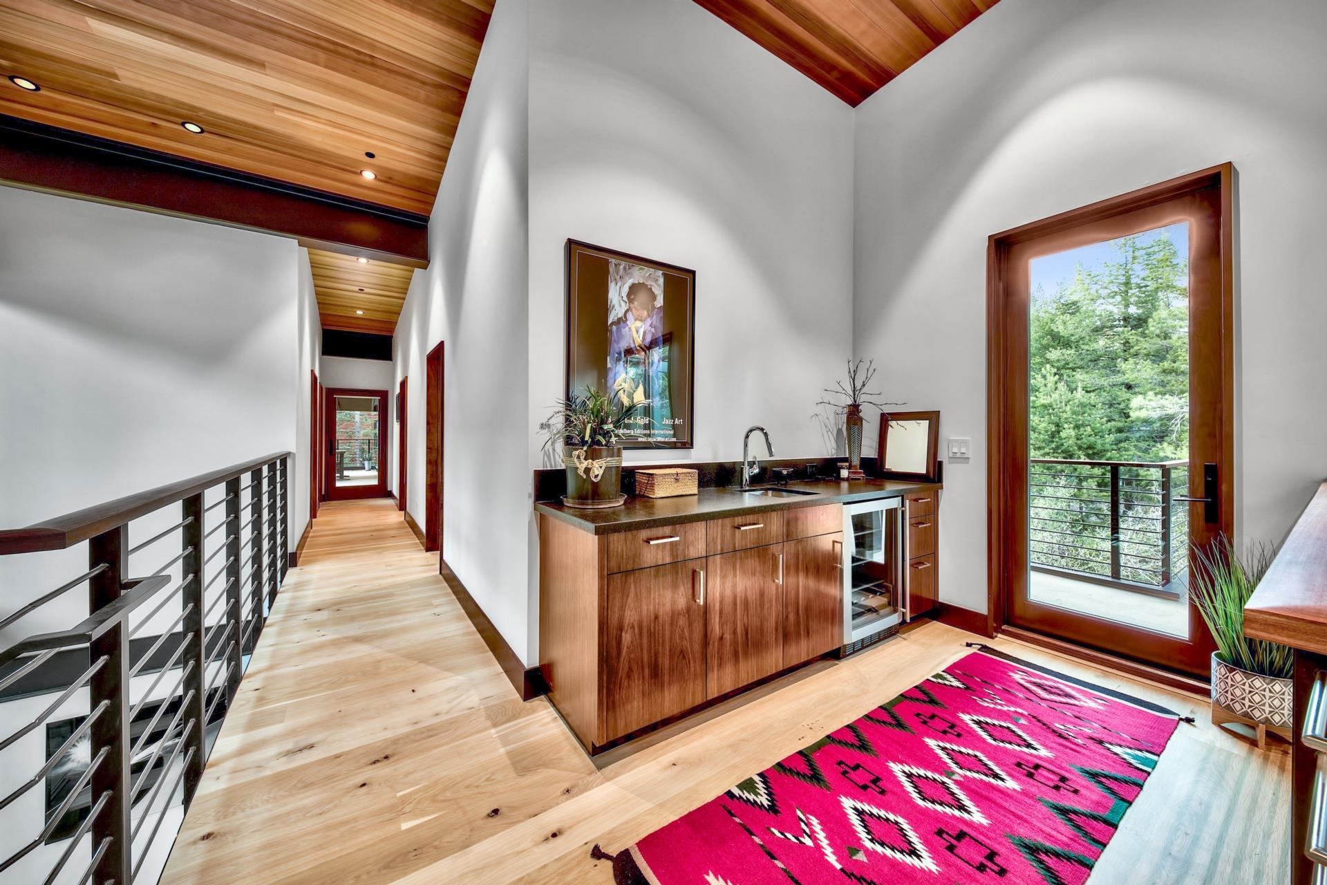 16150 Pine Street Truckee, CA 96161 - Photo 16 of 21 a kitchen with stainless steel appliances granite countertop a stove a sink and a refrigerator