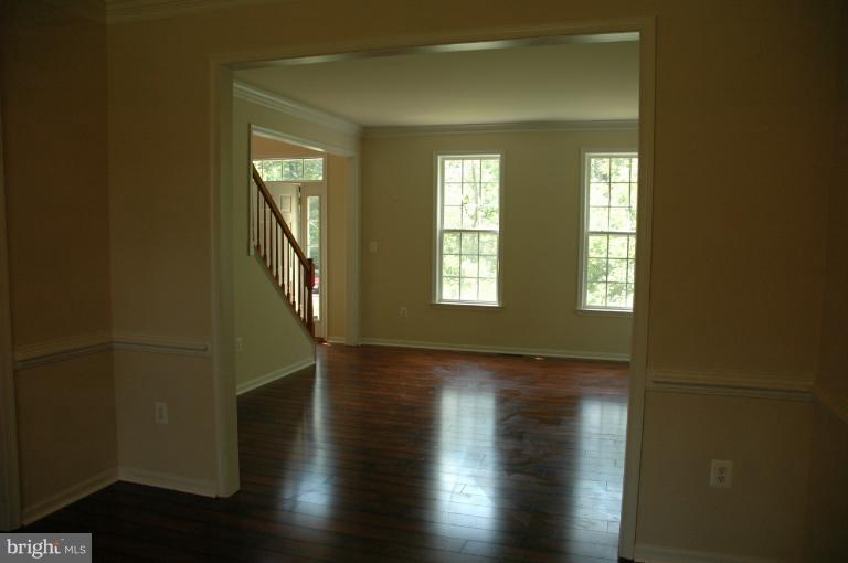 6931 North Stuart Road King George, VA 22485 - Photo 3 of 30 a view of livingroom with hardwood floor and window