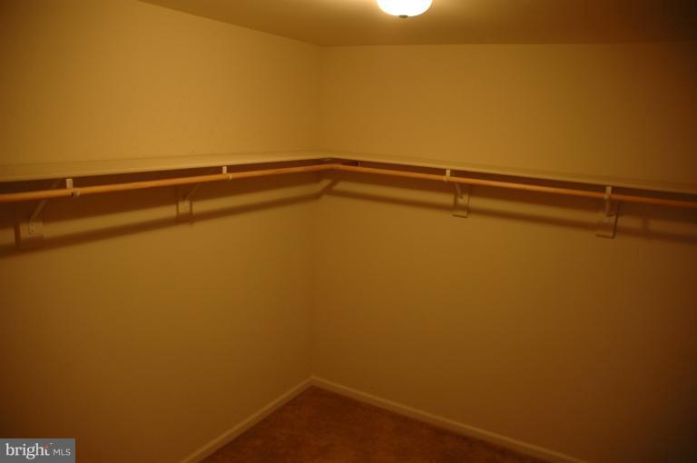 6931 North Stuart Road King George, VA 22485 - Photo 5 of 30 a view of a room with racks on the wall