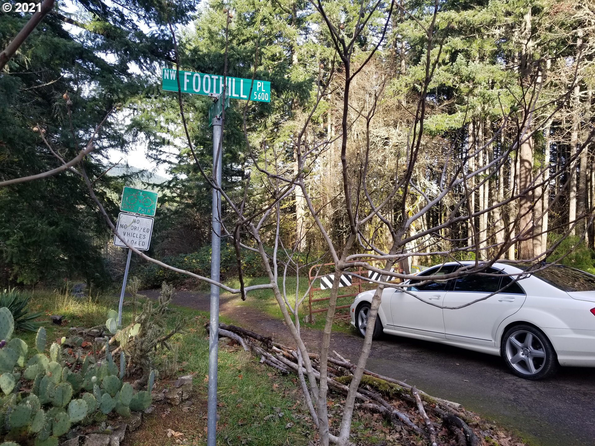 Northwest Foothill Drive Corvallis, OR 97330 - Photo 5 of 31 a car parked in front of a house and cars parked on road