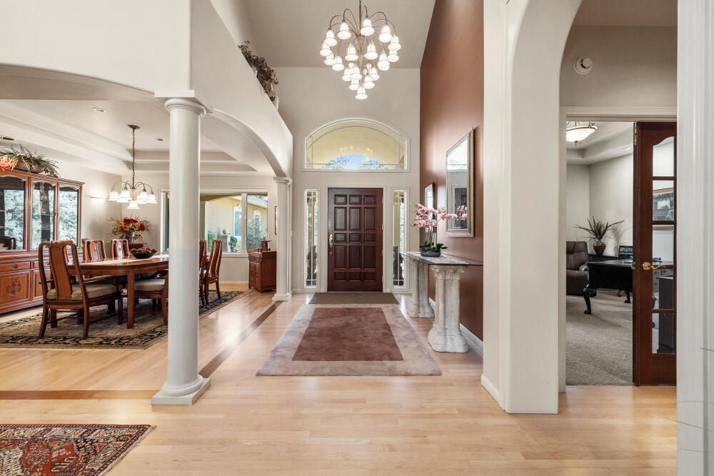 11629 Merganser Road Klamath Falls, OR 97601 - Photo 4 of 50 a view of a lobby with furniture and a chandelier