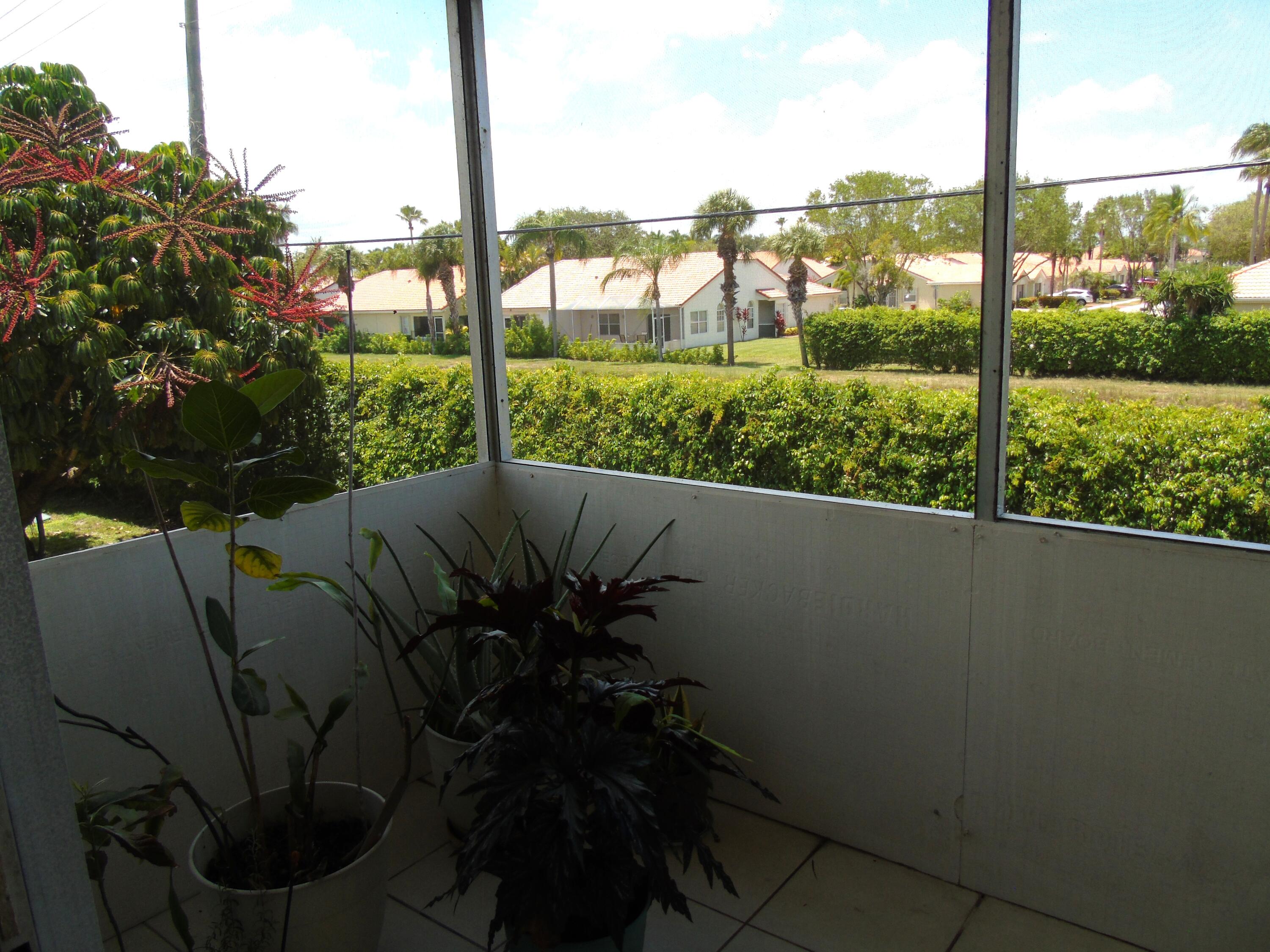 219 Normandy Lane Delray Beach, FL 33484 - Photo 19 of 33 a view of balcony with furniture