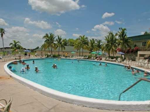 219 Normandy Lane Delray Beach, FL 33484 - Photo 29 of 33 a view of a garden