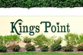 219 Normandy Lane Delray Beach, FL 33484 - Photo 33 of 33 a view of outdoor space with signage and flags