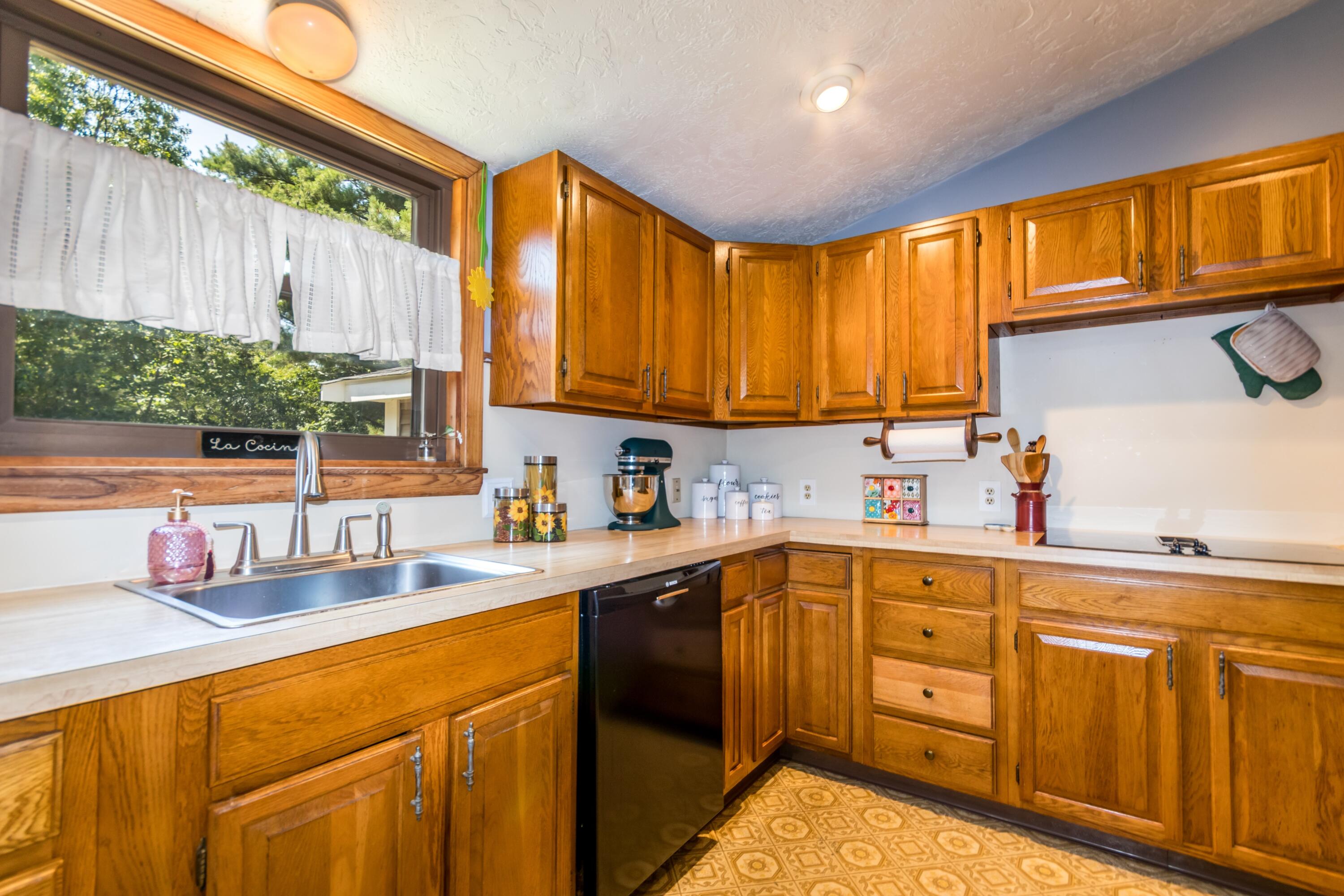 32 North Carver Road West Wareham, MA 02576 - Photo 13 of 42 a kitchen with a sink stove and cabinets
