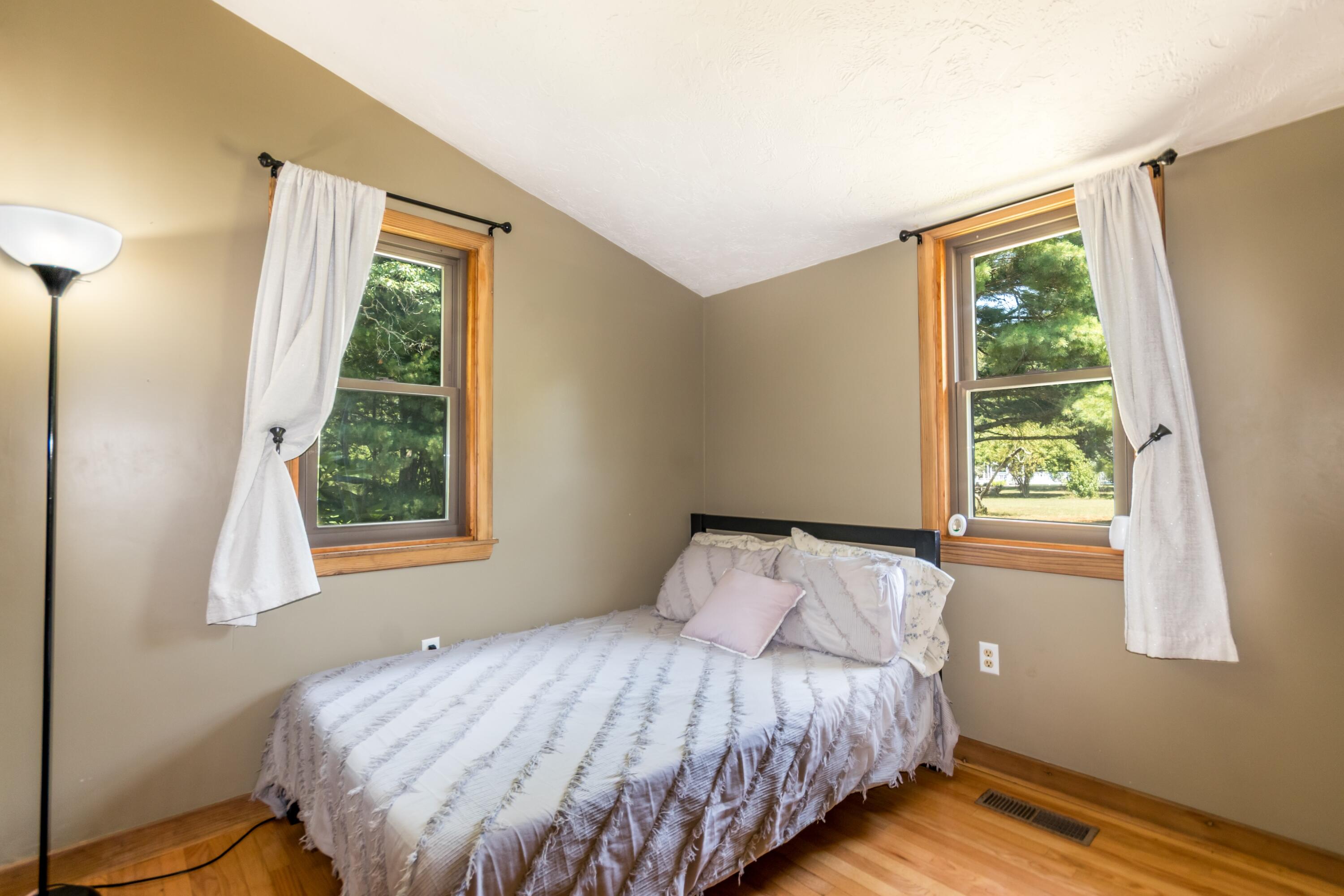 32 North Carver Road West Wareham, MA 02576 - Photo 18 of 42 a bedroom with a bed and a window