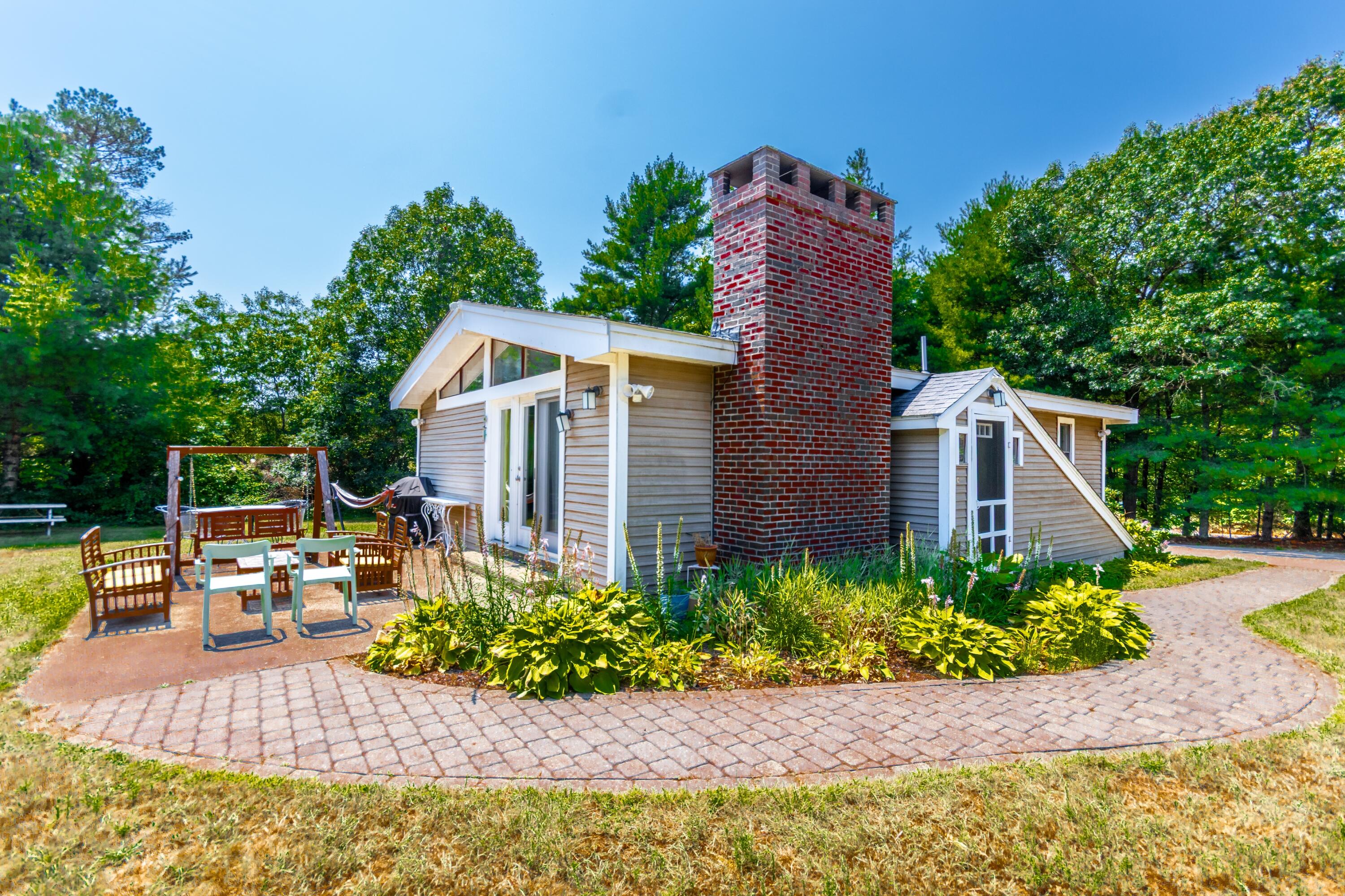 32 North Carver Road West Wareham, MA 02576 - Photo 23 of 42 a front view of a house with a yard