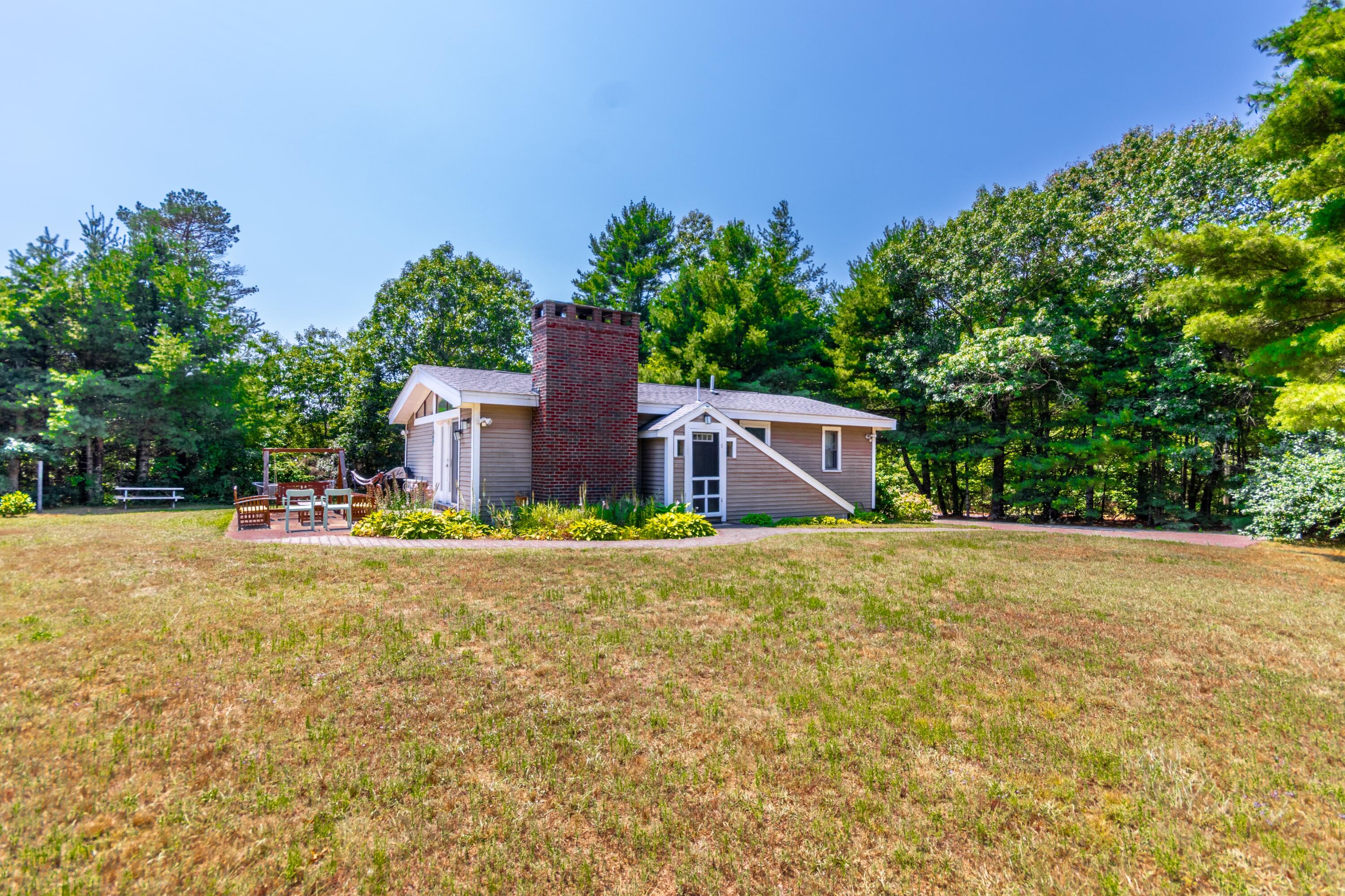 32 North Carver Road West Wareham, MA 02576 - Photo 24 of 42 a house with trees in the background