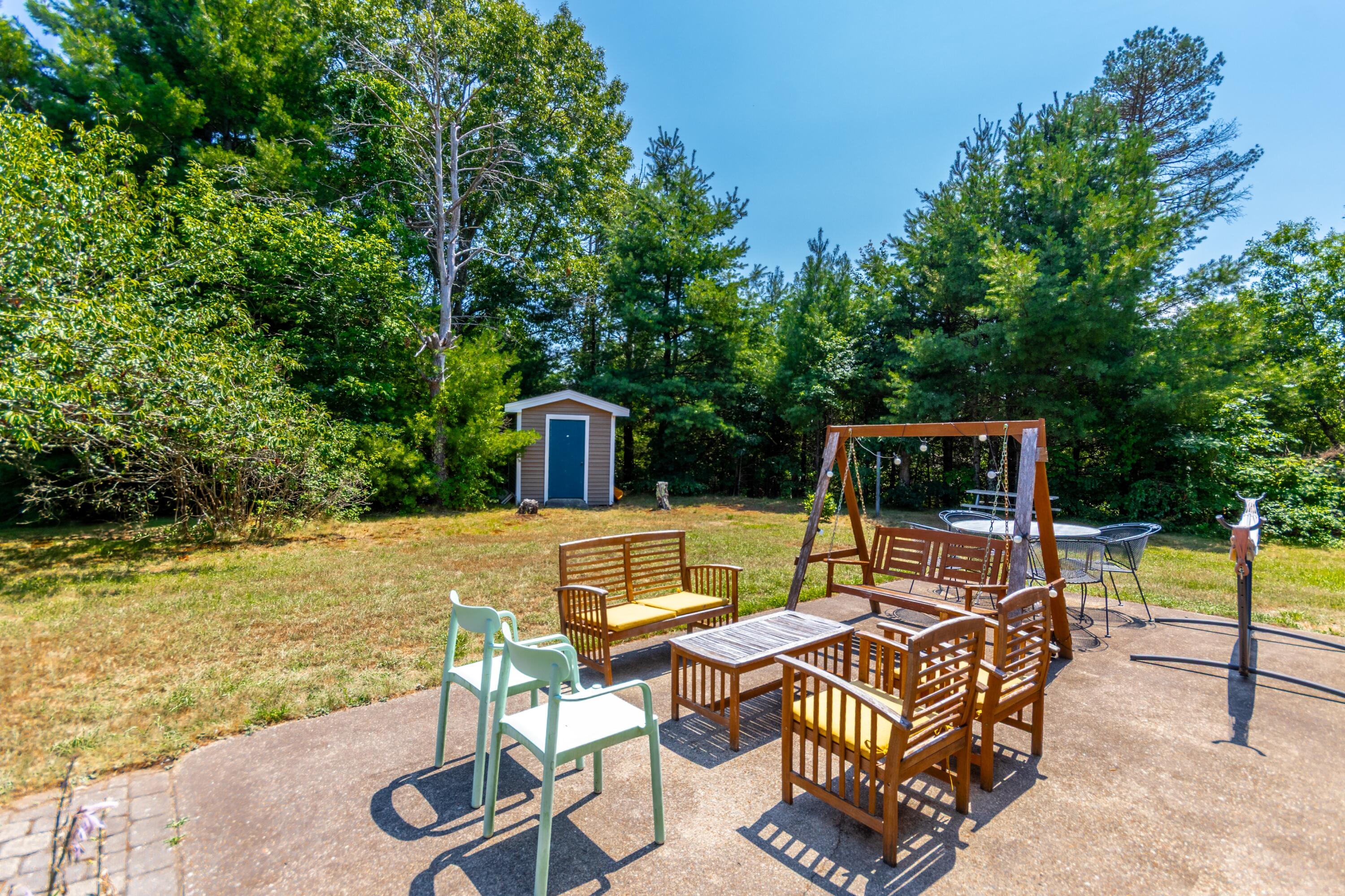 32 North Carver Road West Wareham, MA 02576 - Photo 27 of 42 a view of a patio with swimming pool