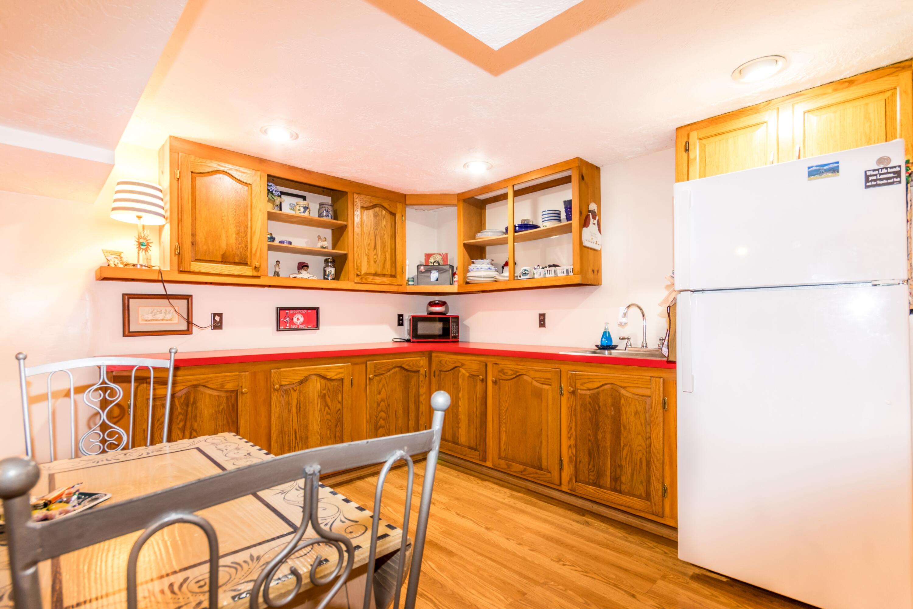 32 North Carver Road West Wareham, MA 02576 - Photo 33 of 42 a kitchen with stainless steel appliances granite countertop a refrigerator and a stove top oven