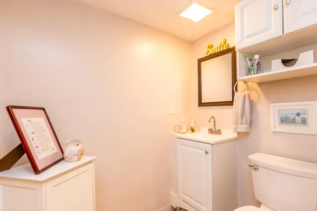 a bedroom with a bed and a cabinets