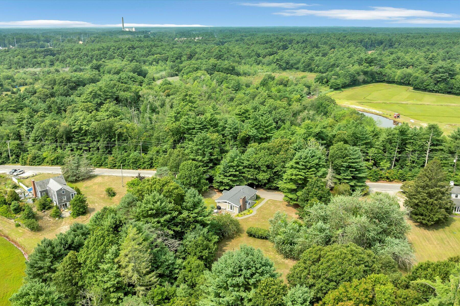 32 North Carver Road West Wareham, MA 02576 - Photo 38 of 42 a view of a big yard with lots of green space