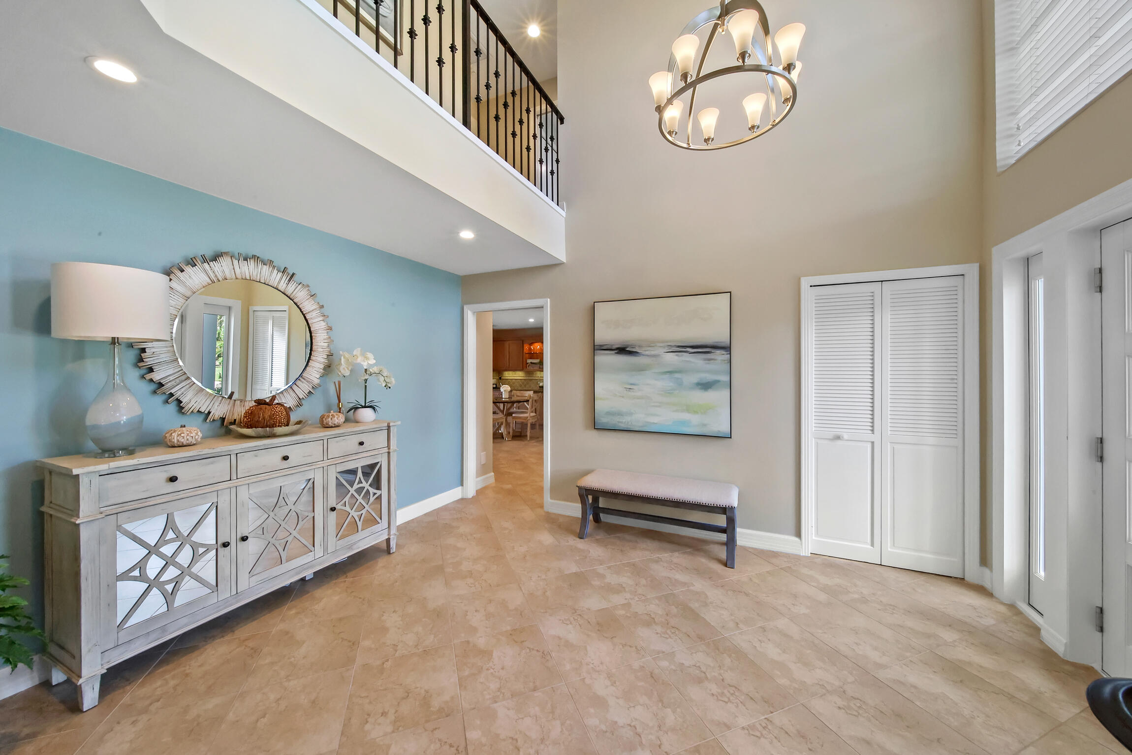 7 Island Road Sewall's Point, FL 34996 - Photo 15 of 70 a view of a hallway with entryway wooden floor and front door