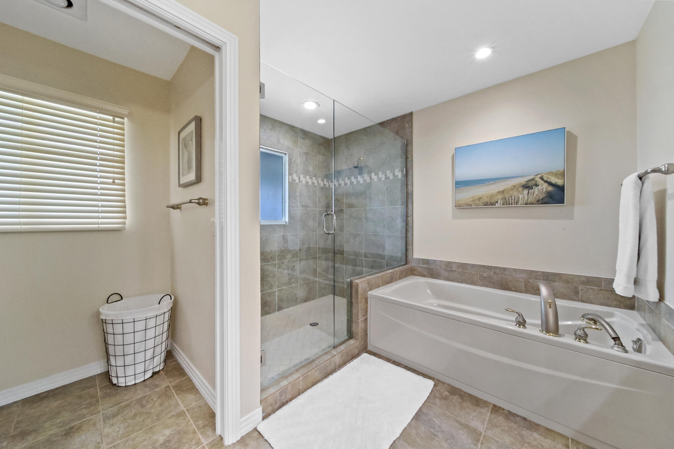 7 Island Road Sewall's Point, FL 34996 - Photo 32 of 70 a bathroom with a bathtub and a shower