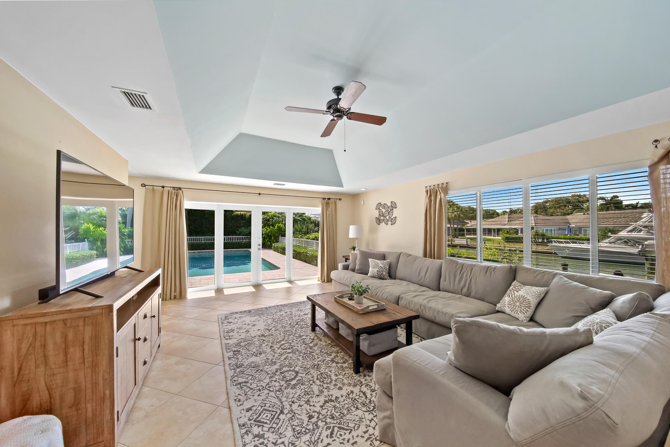 7 Island Road Sewall's Point, FL 34996 - Photo 34 of 70 a living room with furniture and a flat screen tv