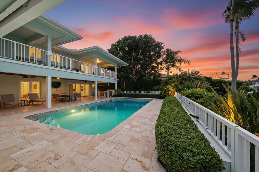 7 Island Road Sewall's Point, FL 34996 - Photo 6 of 70 a view of a house with swimming pool and sitting area