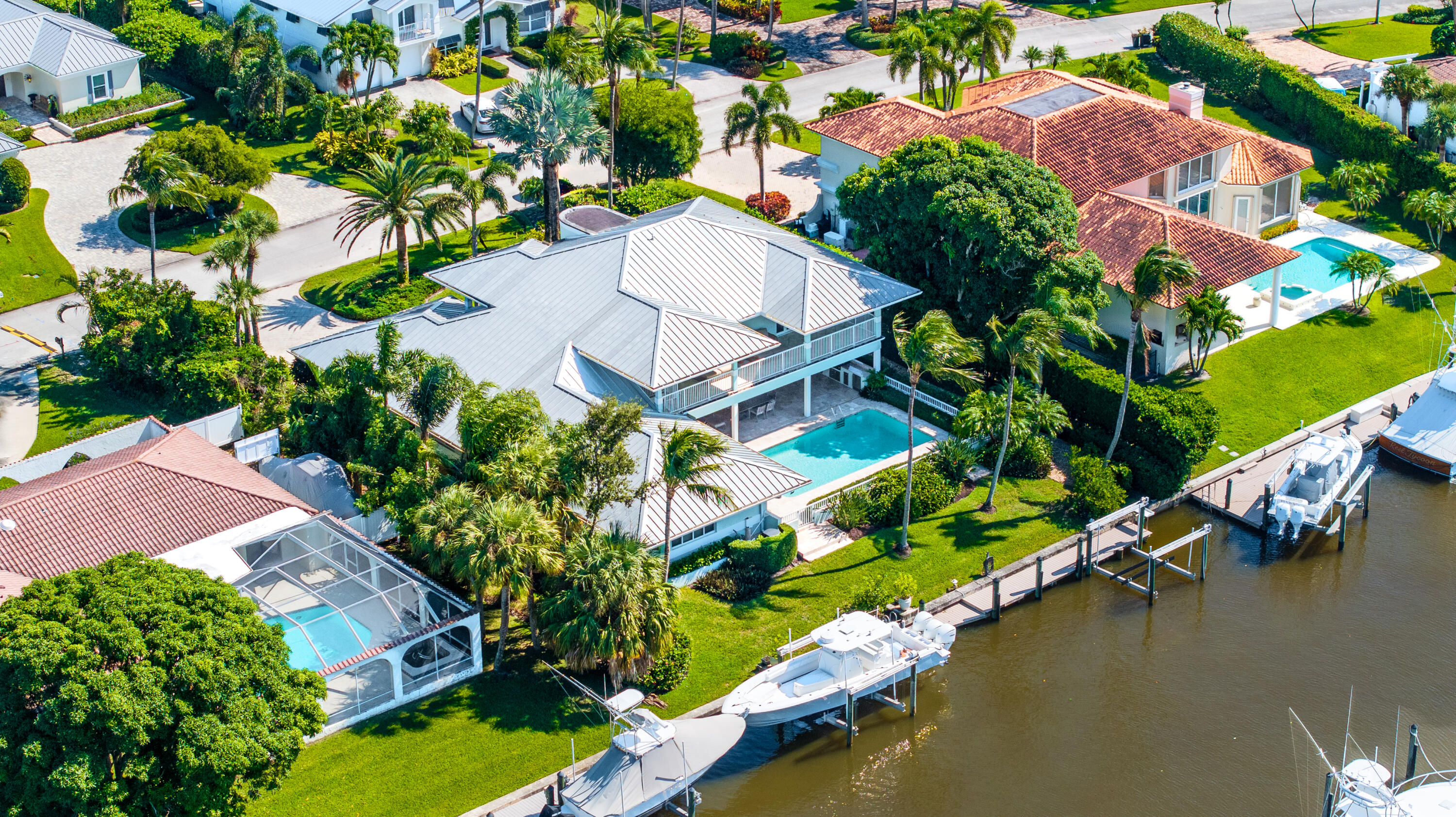 7 Island Road Sewall's Point, FL 34996 - Photo 67 of 70 an aerial view of a house with a garden and lake view