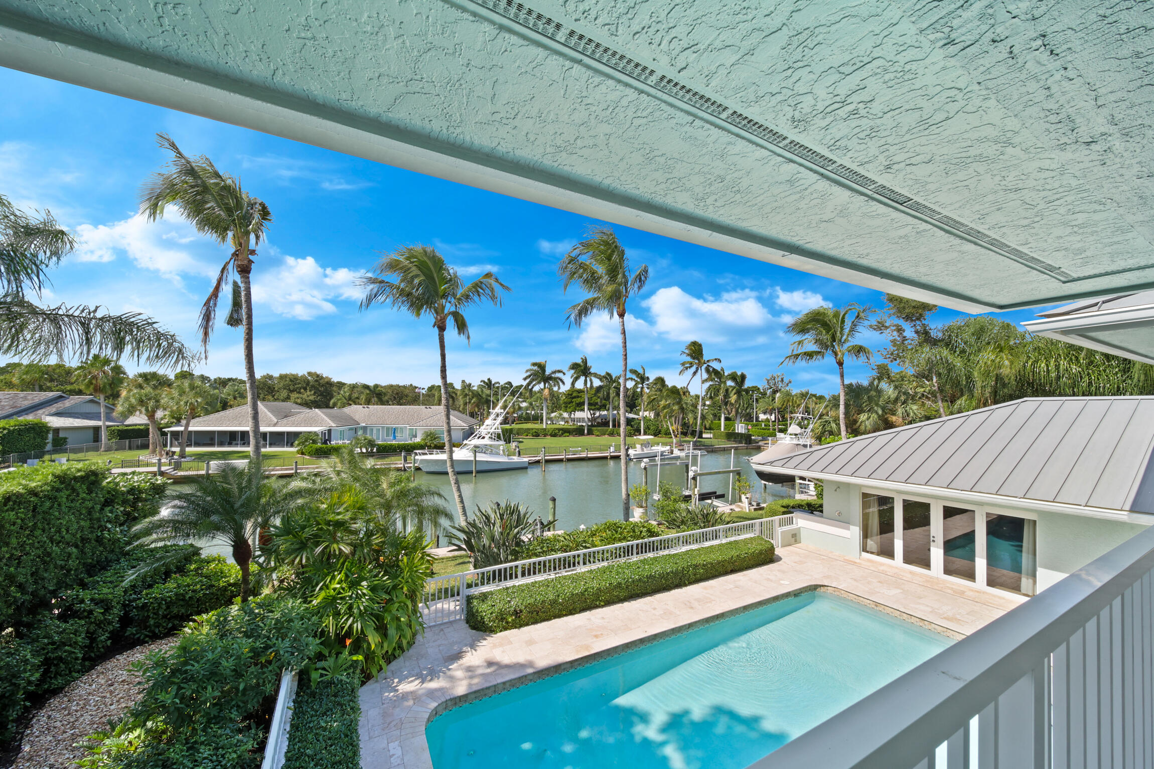 7 Island Road Sewall's Point, FL 34996 - Photo 8 of 70 a view of a house with a swimming pool