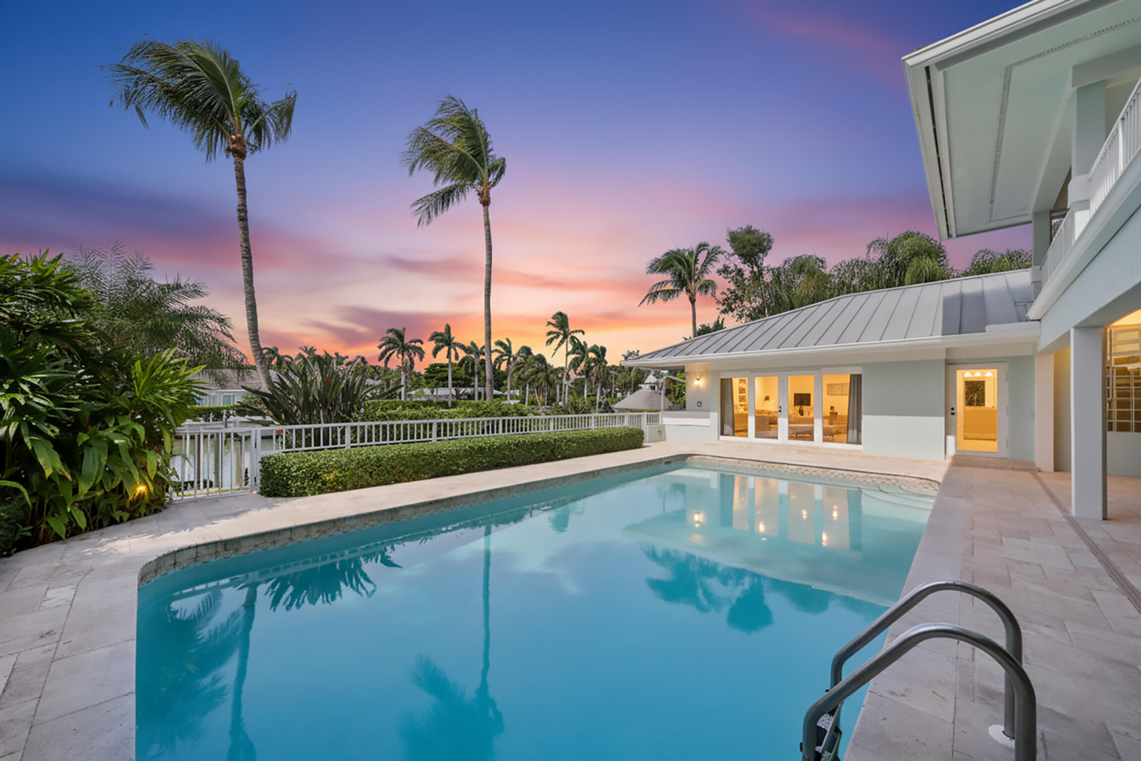 7 Island Road Sewall's Point, FL 34996 - Photo 10 of 70 a view of a swimming pool with a yard