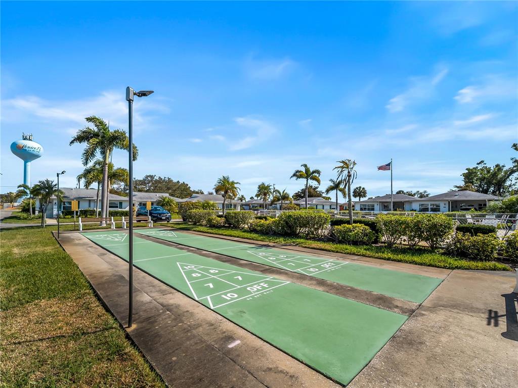 116 The Corso, Unit 116 Venice, FL 34285 - Photo 31 of 36 a view of a playground with basketball court
