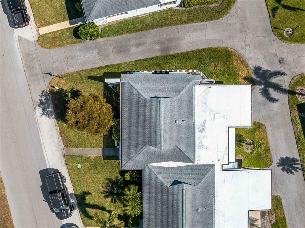 116 The Corso, Unit 116 Venice, FL 34285 - Photo 35 of 36 an aerial view of residential house with outdoor space