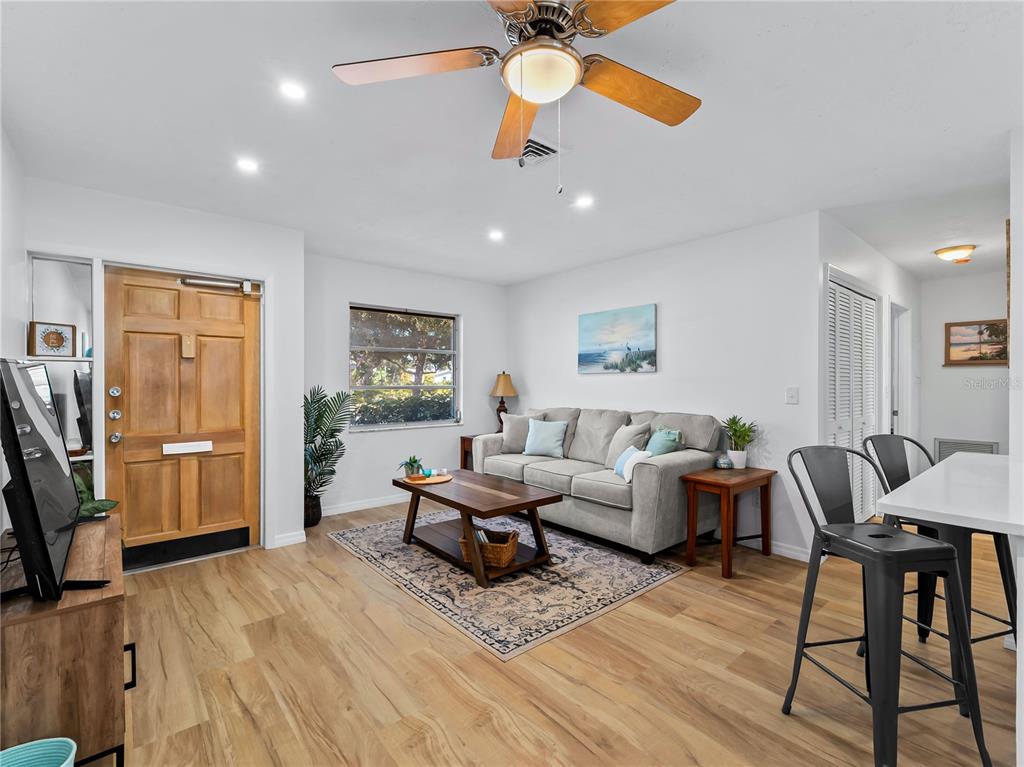 116 The Corso, Unit 116 Venice, FL 34285 - Photo 4 of 36 a living room with furniture