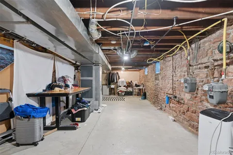 a view of a chairs and table in a patio