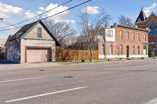 a view of a house with a street