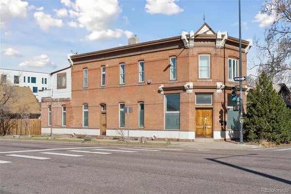 a view of a building with a street