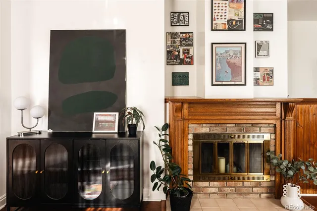 a kitchen with a refrigerator and a sink
