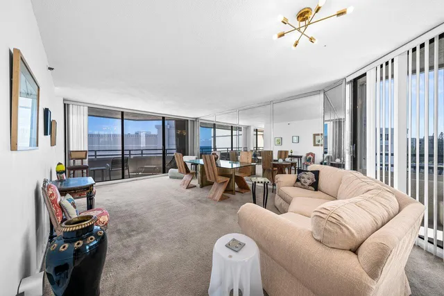 a living room with furniture and a table