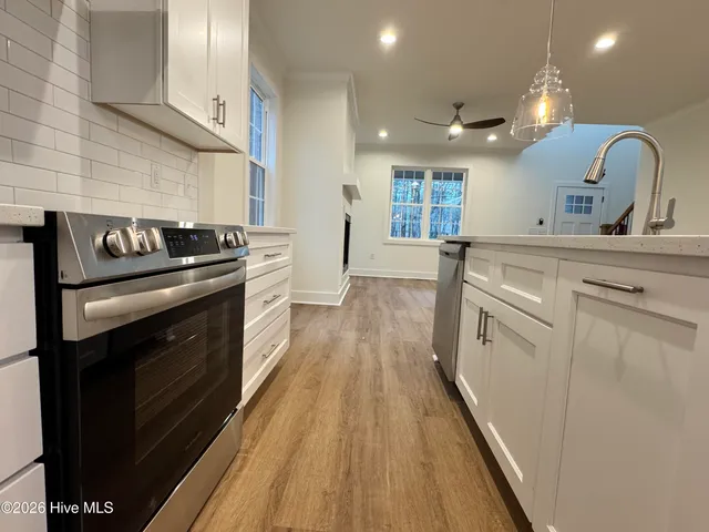 $395,000 | 727 Heartleaf Court, Vass, NC 28394