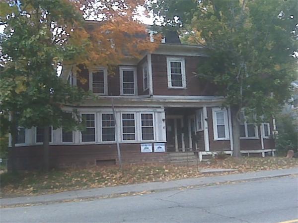 268 School Street Athol, MA 01331 - Photo 2 of 5 a front view of a house with a yard and garage