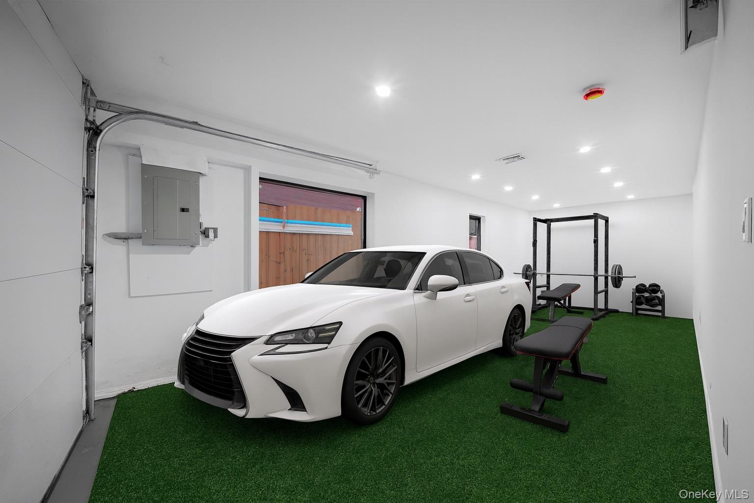 218-37 Spencer Avenue Queens, NY 11427 - Photo 5 of 31 Garage featuring recessed lighting and electric panel