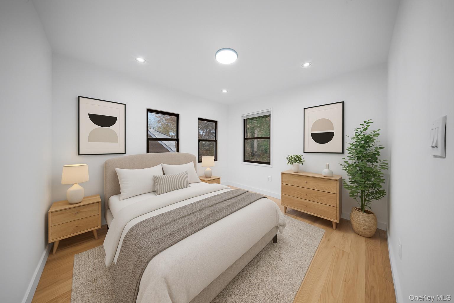 218-37 Spencer Avenue Queens, NY 11427 - Photo 7 of 31 Bedroom featuring light wood-style flooring and recessed lighting