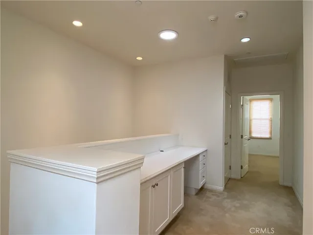 a view of a hallway with closet