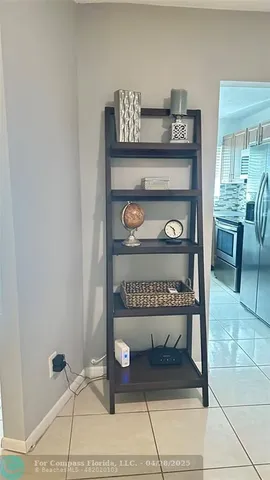 a kitchen with stainless steel appliances granite countertop a stove microwave and oven