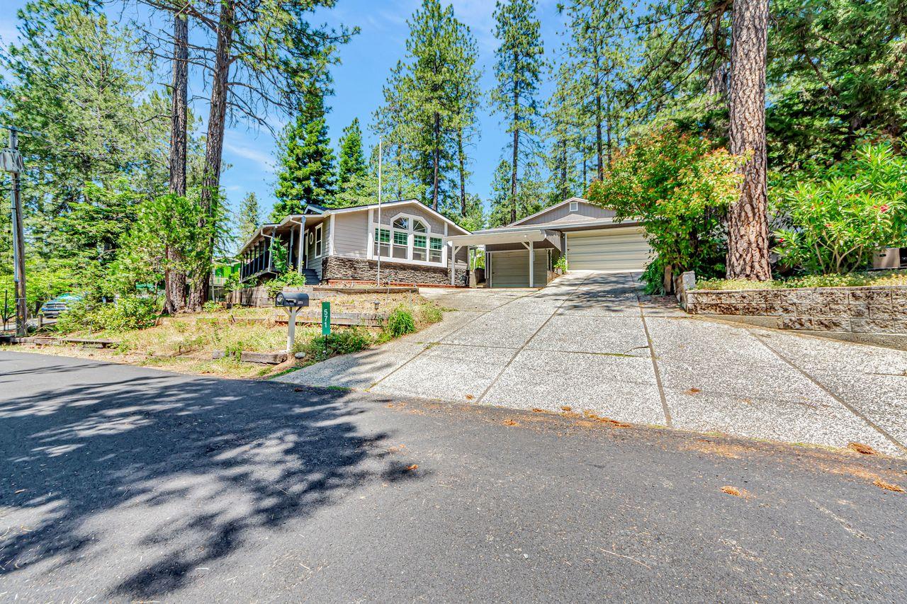 571 B Lane Applegate, CA 95703 - Photo 2 of 85 a front view of a house with a garden