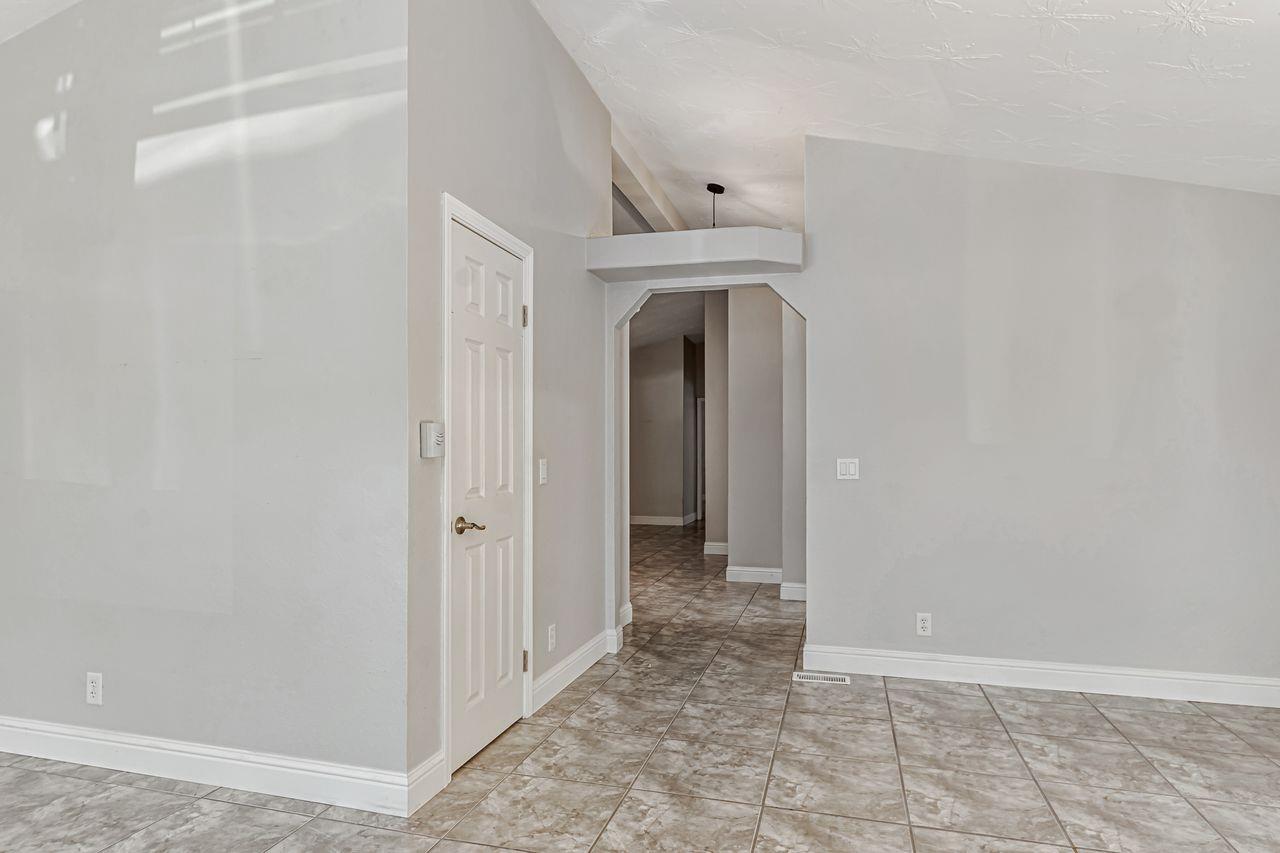 571 B Lane Applegate, CA 95703 - Photo 26 of 85 a view of a hallway with wooden shelves